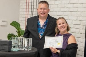 Photographer, Heather Hathaway accept's the 2024 TAPPA President's Choice Award.