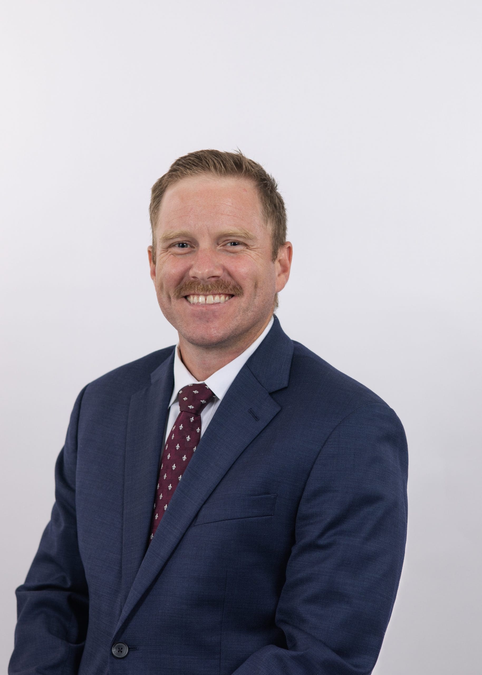 A local Palm Harbor professional poses in studio for a headshot session.
