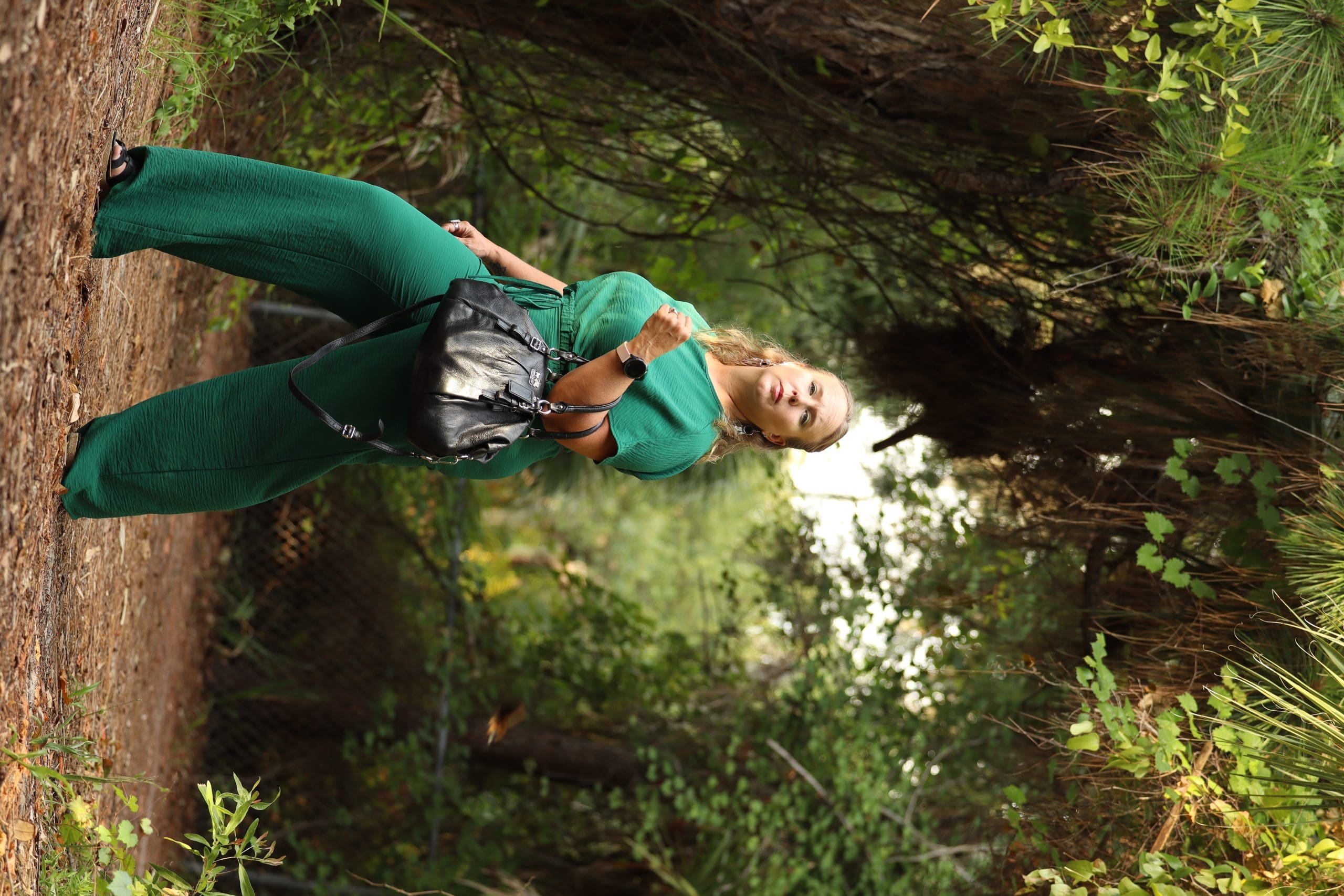 A self portrait of Heather Hathaway in the woods of Fred Howard Park.